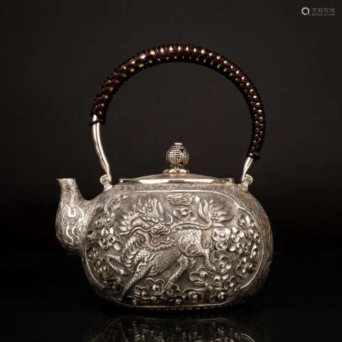 CHINESE EXPORT REPOUSSED SILVER TEA POT QILIN MOTIF