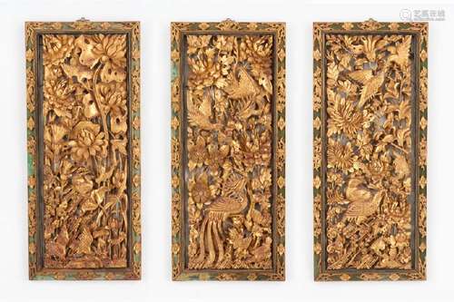 THREE CARVED GILT AND LACQUERED WOOD WALL PANELS