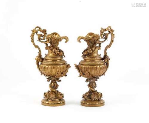 PAIR OF BRONZE EWERS