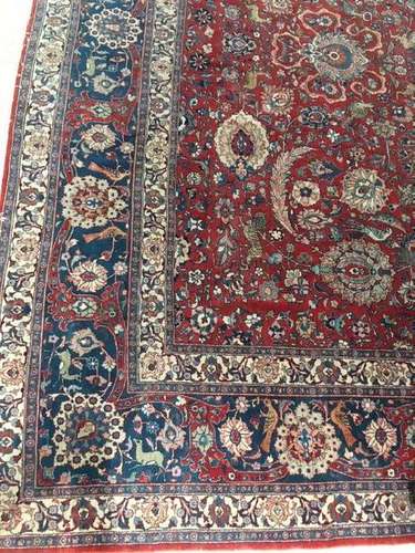 A FINE WOOL & SILK BLENDED TABRIZ CARPET