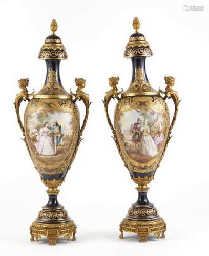 A MONUMENTAL PAIR OF FRENCH PORCELAIN URNS