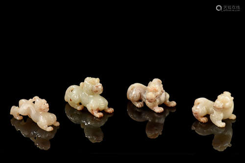 SET OF FOUR JADE CARVED 'PIXIU' FIGURE