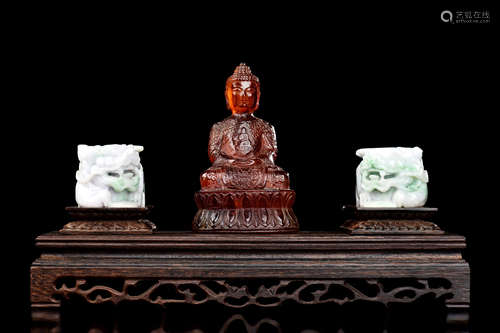 AMBER CARVED BODHISATTVA AND PAIR OF JADE CARVED LIONS