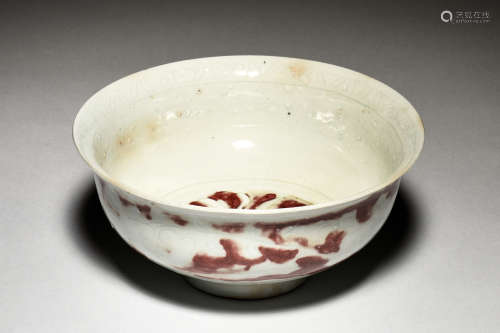 UNDERGLAZED RED AND CARVED BOWL