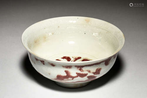 UNDERGLAZED RED AND CARVED BOWL