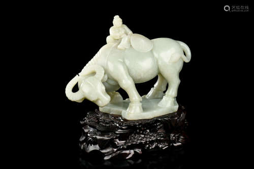 JADE CARVED 'CHILD AND WATER BUFFALO' FIGURE WITH WOODEN STAND