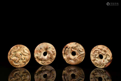 SET OF FOUR ARCHAIC JADE CARVED ORNAMENTS