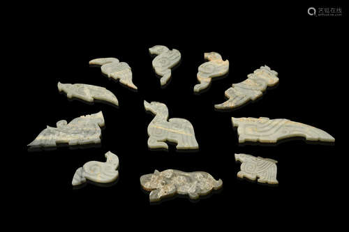 SET OF ELEVEN ARCHAIC JADE CARVED 'ANIMALS' ORNAMENTS