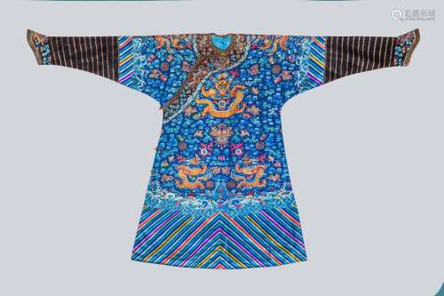 An Embroidered Blue Silk Dragons Robe, China, Qing Dynasty.