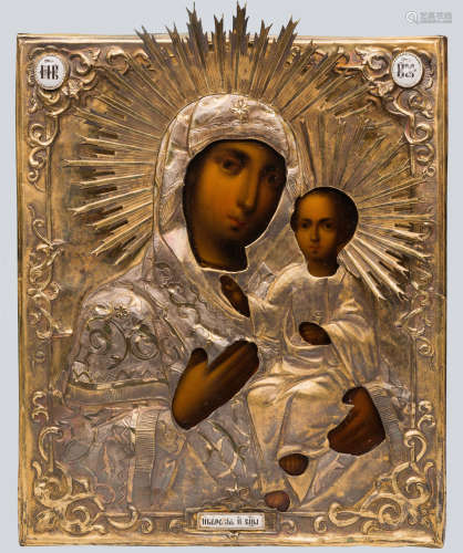 A Russian Icon of The Iverskaya Mother of God with Gilt Silver Oklad.