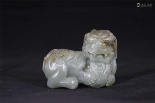An Archaic Style Jade Figurine, Qing Dynasty.