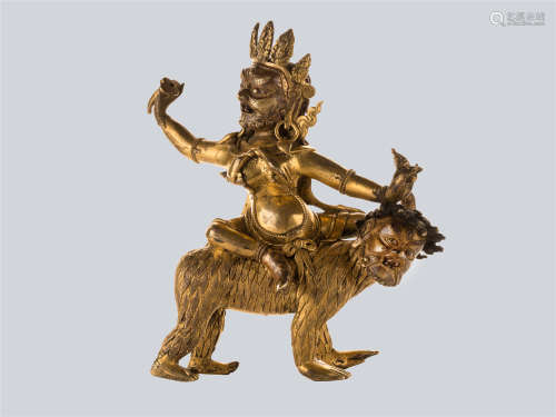An Extremely Rare Gilt Bronze Figure of Dongmarma Riding a Demon Rakshasa, Tibet, 18th Century.
