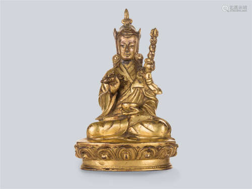 A Gilt Bronze Figure of Padmasambhava, Tibet 17th Century.