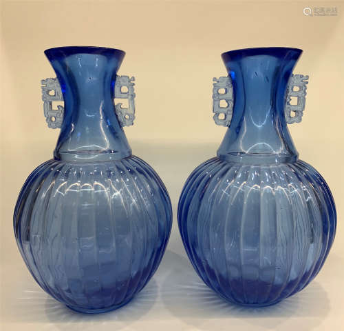 A Pair of Sapphire-Blue Peking Glass vases, Qing Dynasty seal marks.