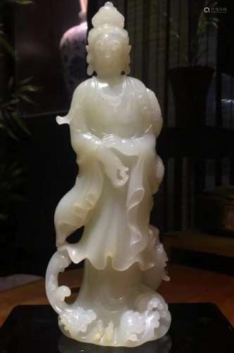 A HETIAN JADE CARVED GUANYIN FIGURE