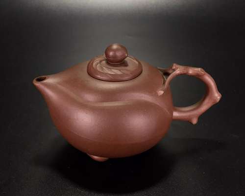 A PEACH SHAPED ZISHA TEAPOT