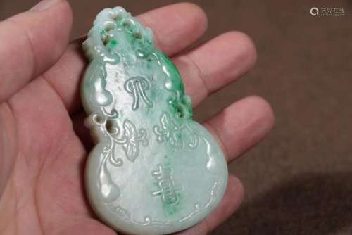 A JADEITE GOURD SHAPED PENDANT