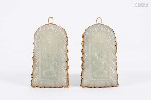 Pair of Chinese gilt jade amulets.