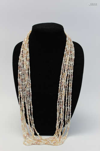 8 strands of seed pearls.