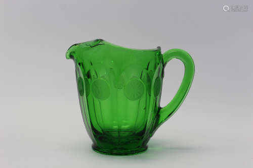 Depression glass-green Fostoria Coin pattern pitcher.