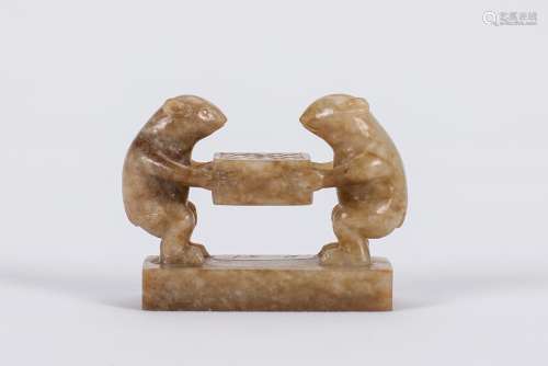 Chinese carved jade seal decorated with two squirrels.