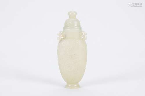 Chinese carved white jade vase.