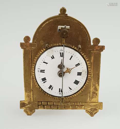 Small Viennese table clock - around 1820, brass case, white enamel dial with black Roman<br />numerals and Arabic Minuterie, brass hands, dial damaged (at III and XI clock), verge escapement, function not tested, signs of age or wear, H.ca. 8cm