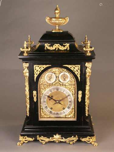 Table clock - 2nd half of the 19th century, architectural ebonized wooden case with gilded<br />bronze fittings, maker: W. + H.Sch. (Winterhalter + Hofmeister, Schonach in the Black Forest, Germany), gold-plated dial with Roman numerals and Arabic minutes, above the ''12'' two sub-dials to regulate lead and lag and hitting / not hitting, 8-day drive, 3/4 hour beat, original pendulum, age or traces of use, HxWxD: approx. 73x41x26cm, with key