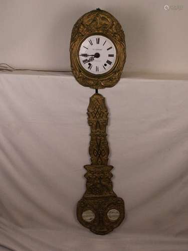 Comtoise - Burgundy clock, France, 1830-45, round enamel dial with Roman numerals and<br />filigree brass hands, inscribed ''Fois Léonard / a Valéras'', framed by an oval embossed brass plate with pair of birds in a cartouche and floral decoration, pendulum with rich relief decoration and two round mirror surfaces, 2 iron weights & crank available, function not checked, signs of age or wear, case L.ca .42cm, pendulum length ca.100cm