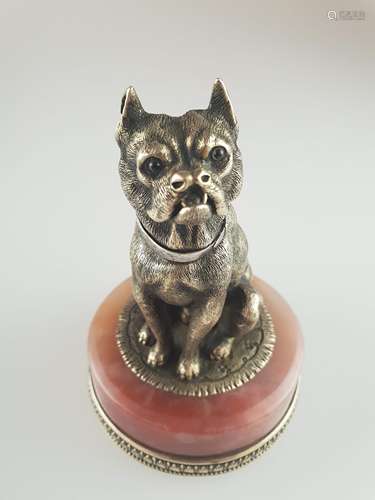 Silver figure ''Seated Bulldog'' in the Fabergé style / paperweight - Russia, full-plastic<br />dog figure sitting on a round onyx base with ornamental silver fittings featuring a palmette frieze and a beaded bordure, hallmarks on collar and thigh: master mark in Cyrillic ''IS'', oval Kokoshnik-mark with head to the right 84 Zolotniki, 1908-1926, probably St.Petersburg, H-figure: ca.9cm / total height: ca.12.5cm