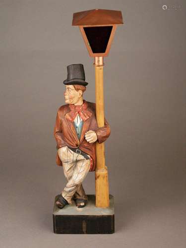 Wooden figure - Automat - ''Whistling drunkard leaning on a lantern'', carved wood, colored,<br />on a wooden base, head rotates in tackt of whiste, marked ''GERMANY'', electrified lantern, battaric box in the base, slight signs of wear, H.ca.46,5cm