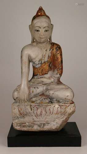 Alabaster Buddha - Burma, Ava style, 18th century, alabaster partially lacquered, Buddha<br />Shakyamuni sitting  in the Padmasana (lotus position) on a simple lotus base, holding a hand in the gesture of ''earth touch'' (bhumisparsa-mudra) as a sign of his victory over the tempter Mara, oval face with a gently smiling expression, on the small Ushnisha a lotus bud as conclusion, H.ca.48cm, mounted on base, total height approx. 51cm, time-related unevenness, larger chip at the base, lacquer with abrasion