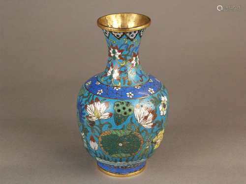 Cloisonné vase - China late Qing Dynasty, 19th century, of bulbous baluster form,<br />multi-coloured floral decoration in traditional cloisonné technique with chrysanthemums, begonias, peonies and lotus on cyan blue ground, decorative border with plum blossoms on ''cracked ice ''-pattern azure ground, signs of age / few time-related chips, stand/base renewed,  height c.21cm (about 8 in) Provenance: acquired in 2014 at the Auction House Lempertz, Cologne (Auction 1034, Asian Art, June 2014, Lot 296)