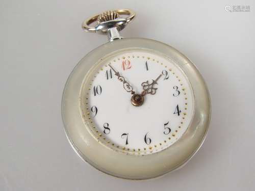 Women's pocket watch with nacre case -um 1900, case of shimmering nacre, white enamel dial<br />with golden hands and Arabic numerals, back cover with monogram ''LS'', movement with crown winding, diameter: ca.29.3 mm, depth: approx. 9.9 mm, weight: approx. 15.4 g, slight signs of age and wear, clock was running by the time of cataloging.