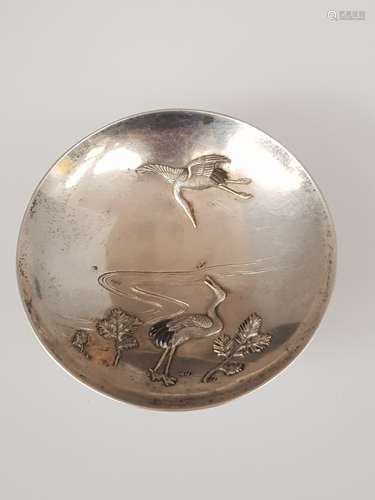 Small silver bowl - China, silver with remains of gilding, round bowl with two cranes in<br />stylized landscape in relief, filigree work, backside with Chinese characters, signs of age and use, HxD.ca.2,5x9cm, weight ca.55.5g