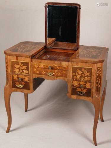 Louis XV Poudreuse with writing tablet - France, Paris ca. 1765, a dresing table, among<br />other: rosewood and satinwood, elongated, curved body with knee-hole for biger leg space, standing on elegantly curved square legs, triple hinged cover plate (the sides outwards and the center to the back), inner panels veneered with rosewood, the middle part mirrored inside, a central drawer in the middle, above it an extendable shelf, covered with black leather, the side elements have two more drawers each, all sides are decorated with framed bouquet, coat of arms of the Republic of the United Netherlands on the middle plate, showing a rising lion with a sword and a bunch of arrows (the lion symbolized the foundations on which the United Provinces were based, unity and military strength), here the crown on the lion's head is not depicted, the heraldic emblem is surrounded by flower garlands and war trophies, floral-formed gilded bronze fittings rubbed, two keys attached, time-related signs of age and wear, veneer with few restorations, large-scale inlay on center plate with almost continuous vertical crack, small chipping and restorations, other inlays partly with slight signs of wear, old mirror with small crack in lower left and a few blind spots, H × W × D: ca.78x86x54cm, expert report (Nov.1977) enclosed