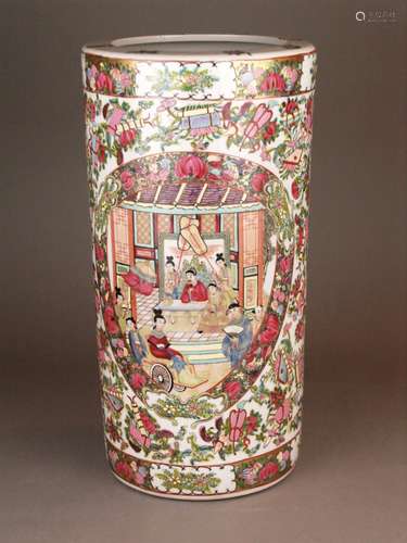 A Canton-style Porcelain Vase - China 20th century, porcelain, of cylindrical shape, ''Rose<br />Medaillon'' decoration:  large populated interior court scenes, surrounded by flowers and Daoist symbols (''anbaxian''), broad ornamental borders featuring fruits and scalloped floral cartouches, red seal mark ''Da Qing Nian Zhi'' to the base, enamels partly slightly worn, H.ca.46cm