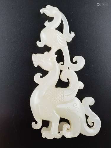 White jade plaque - China, fine jade plaque, perforated, elaborated in a form of a double<br />figure: phoenix and dragon, ca.9,5 x (up to) 5cm, ca.53g