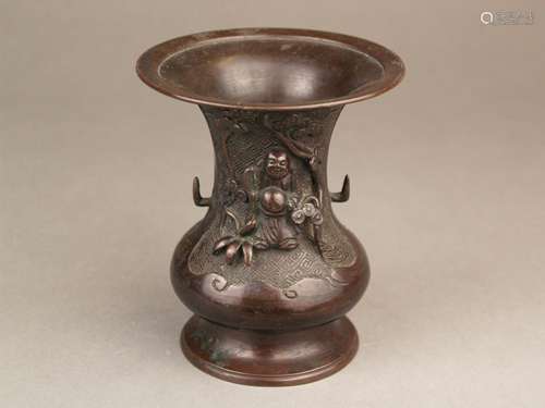 Bronze vase - bronze vessel with trumpet-like mouth and constricted foot, at the neck over<br />meander background representation of Hotei with fan as well as blooming tree branches in half relief, laterally hook handles, h.ca.13,5cm, Japan, Meiji time