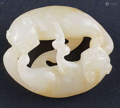 Shuanghuan jade carving - China, Qing Dynasty, 19th century, dark-white jade with a few<br />beige inclusions, well carved in the round and in openwork as two huan facing each other with paws touching, symbols of the joys of marriage, softly polished, c.4x3.5cm