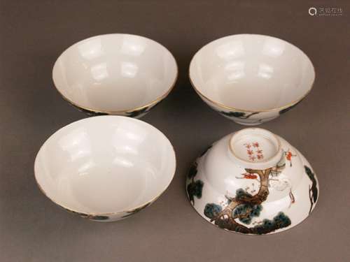 Set of four ''longevity'' porcelain bowls - China,  porcelain painted in overglaze enamels<br />with longevity symbols: pine, crane and lingzhi fungus, gold rim slightly rubbed, red kaishu base mark ''Da Qing Guangxu Nian Zhi '', but  later, dm.c.13cm/h.c.5,5cm