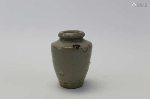 A Chinese celadon miniature vase