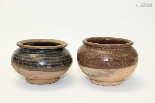 A pair of Chinese pottery jars.