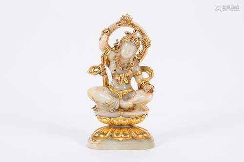 Chinese gilt carved jade figure.