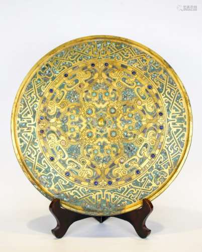 A Tang Period Turquoise-Inlaid Gilt Bronze Mirror