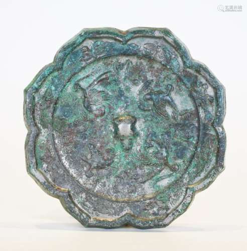A Tang Period Octagonal 'Phoniex' Bronze Mirror