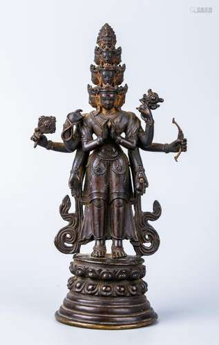 A Chinese Tibetan Bronze Figure Of Eleven-Headed Avalokiteshvara