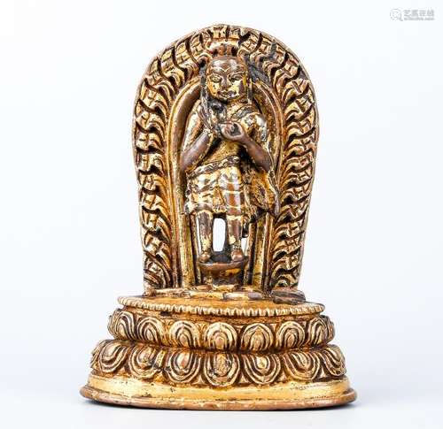 A Nepalese Gilt Bronze Standing Figure Of Buddha