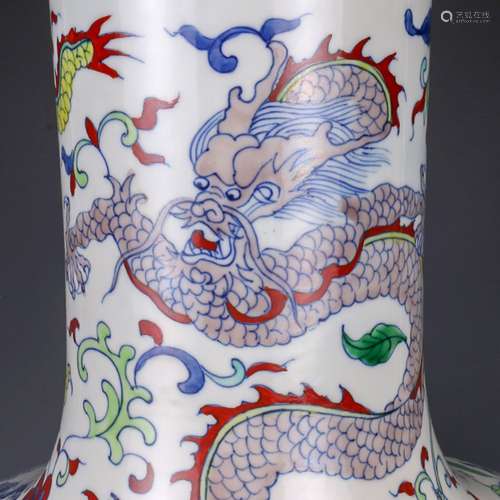 A Fine Doucai 'Dragon' Bottle Vase