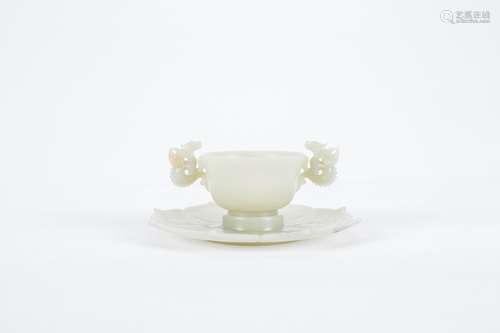 Chinese jade cup and holder.